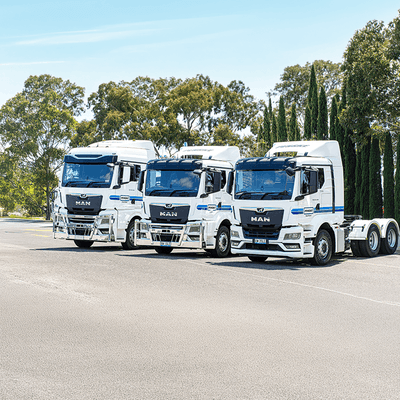 Three Penske Trucks