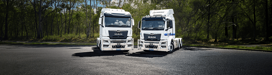Two Penske Trucks