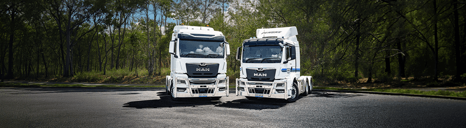 Two Penske Trucks