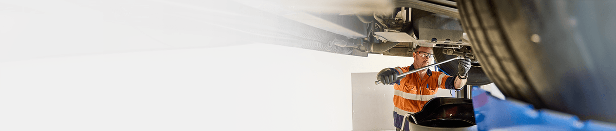 Maintenance technician working on a truck